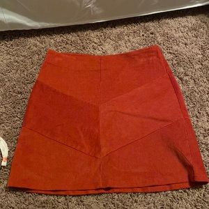 burnt orange skirt!
